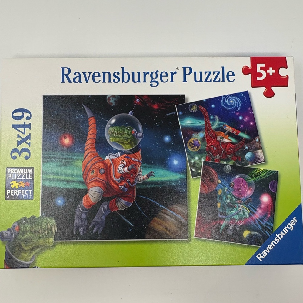 RAVENSBURGER: Dinosaurs in Space Jigsaw Puzzles. Three (3) 49-piece Puzzles.
